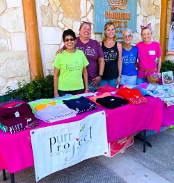 Volunteers at the PuRR Project booth